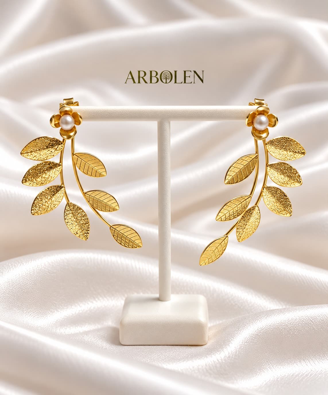 ARETES HOJA COLGANDO CON DETALLE DE PERLA