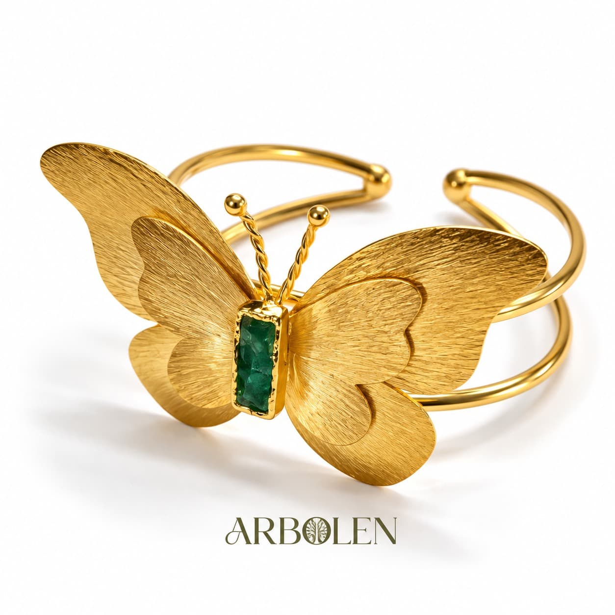 brazalete mariposa con detalle en esmeralda